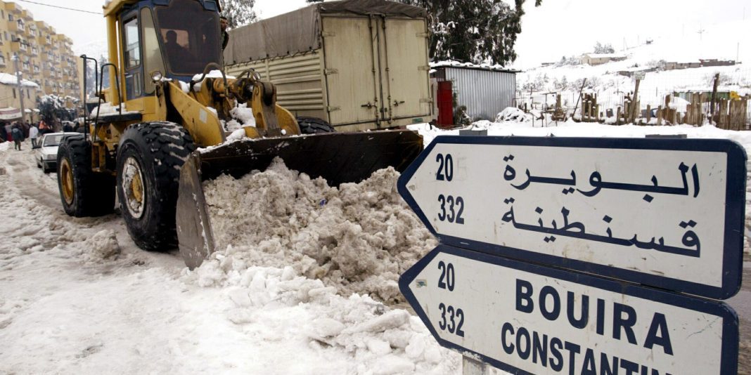 vehicles clear roads of snow as Algeria experience heaviest snow in more than 50 years